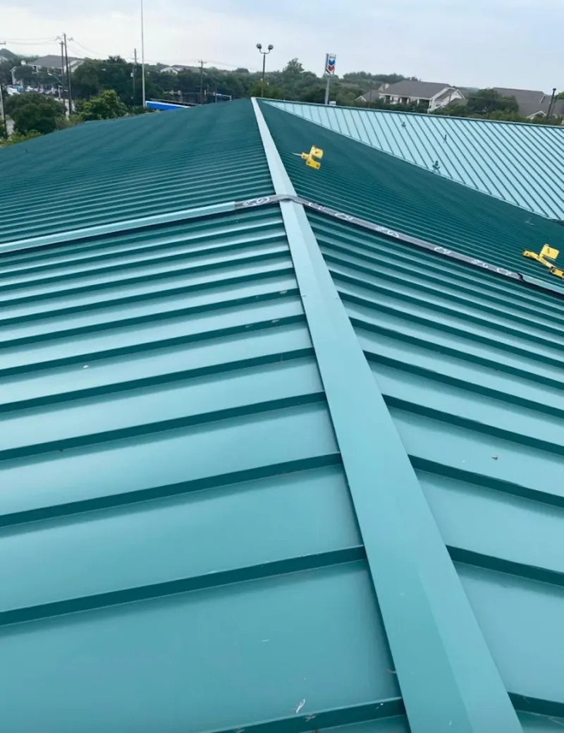 Green commercial metal roof ridge and valley for Metal Roof Repair in South Milwaukee