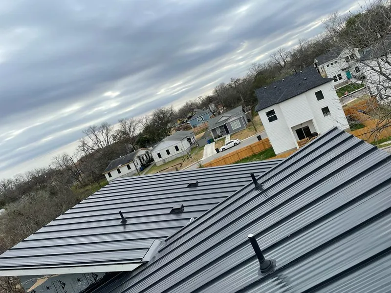 Standing seam metal roof panels with vents for Skylight Repair in South Milwaukee